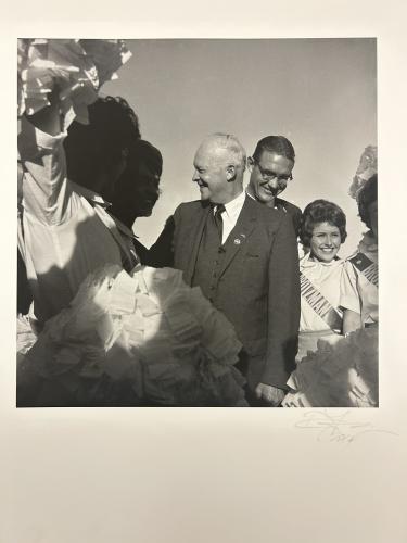 President Eisenhower shaking hands in a crowd