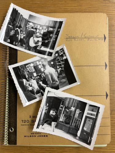 Three photos arranged on top of a notebook