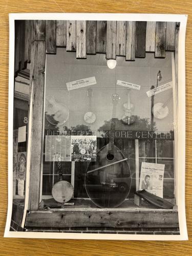 A photo of the exterior of the DFC, with instruments hanging in the window.