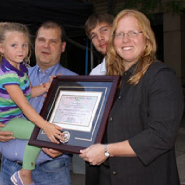 Kristi receiving her Distinguished Researcher Award