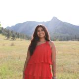 Sanjana in front of the Boulder Flatirons