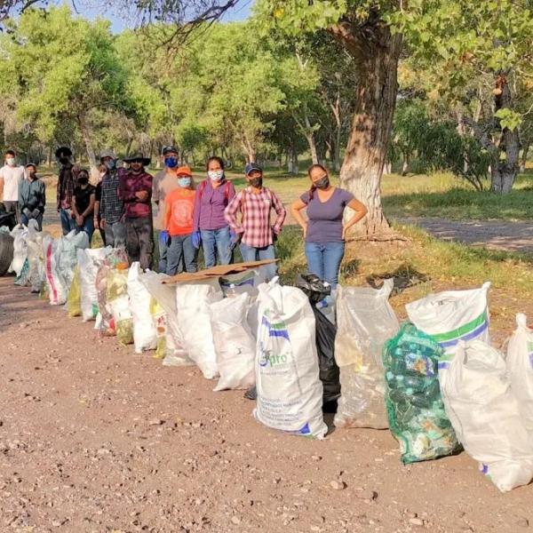 Volunteers-pose-with-trash-bags