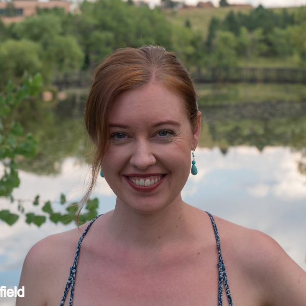 Anna if front of the pond