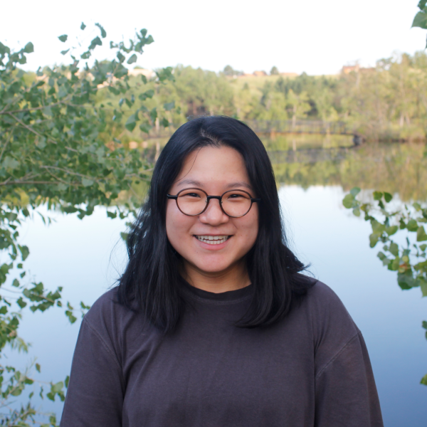 Clara in front of a pond