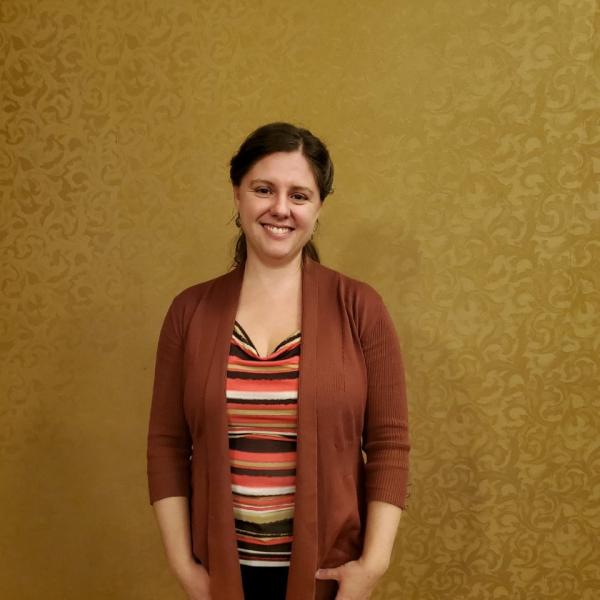 Lauren Hosek standing in her lab