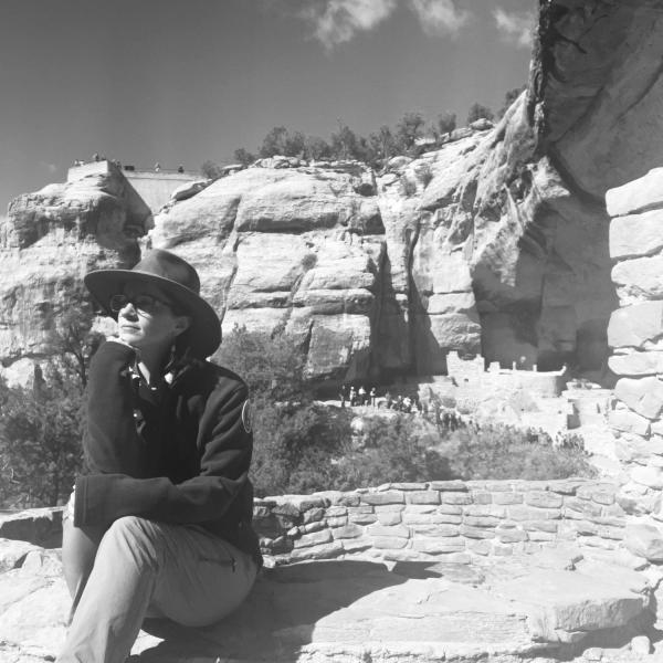 Black and white photo of Scarlett on the rocks