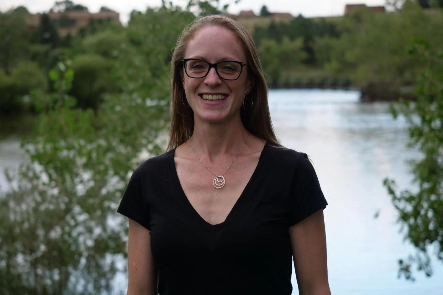 kate goldfarb in front of a pond