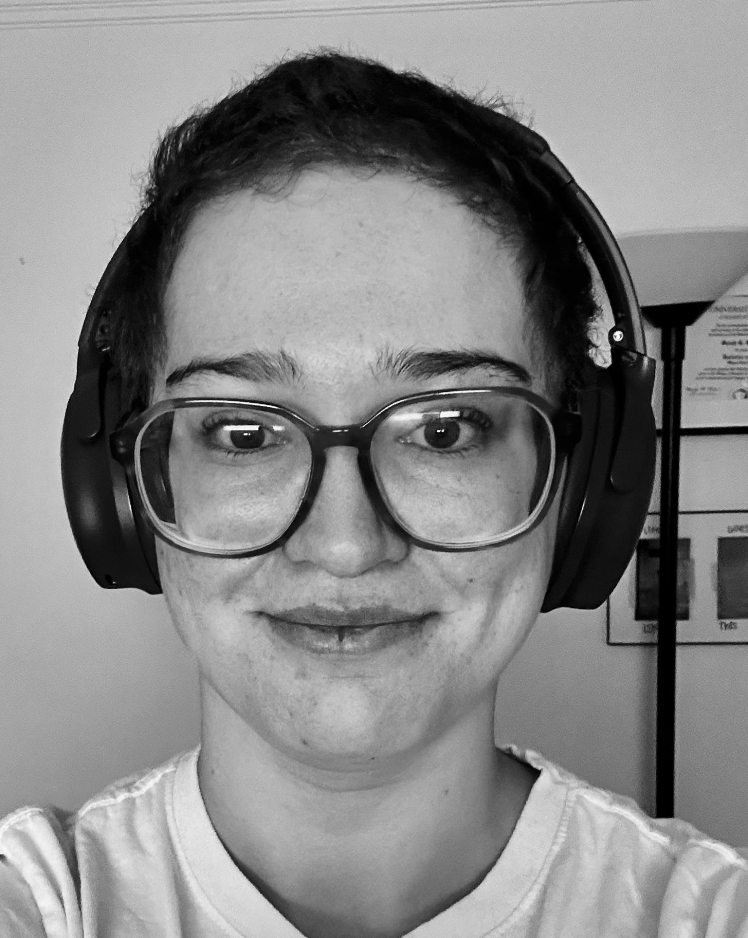 B&W of Sasha wearing headphones