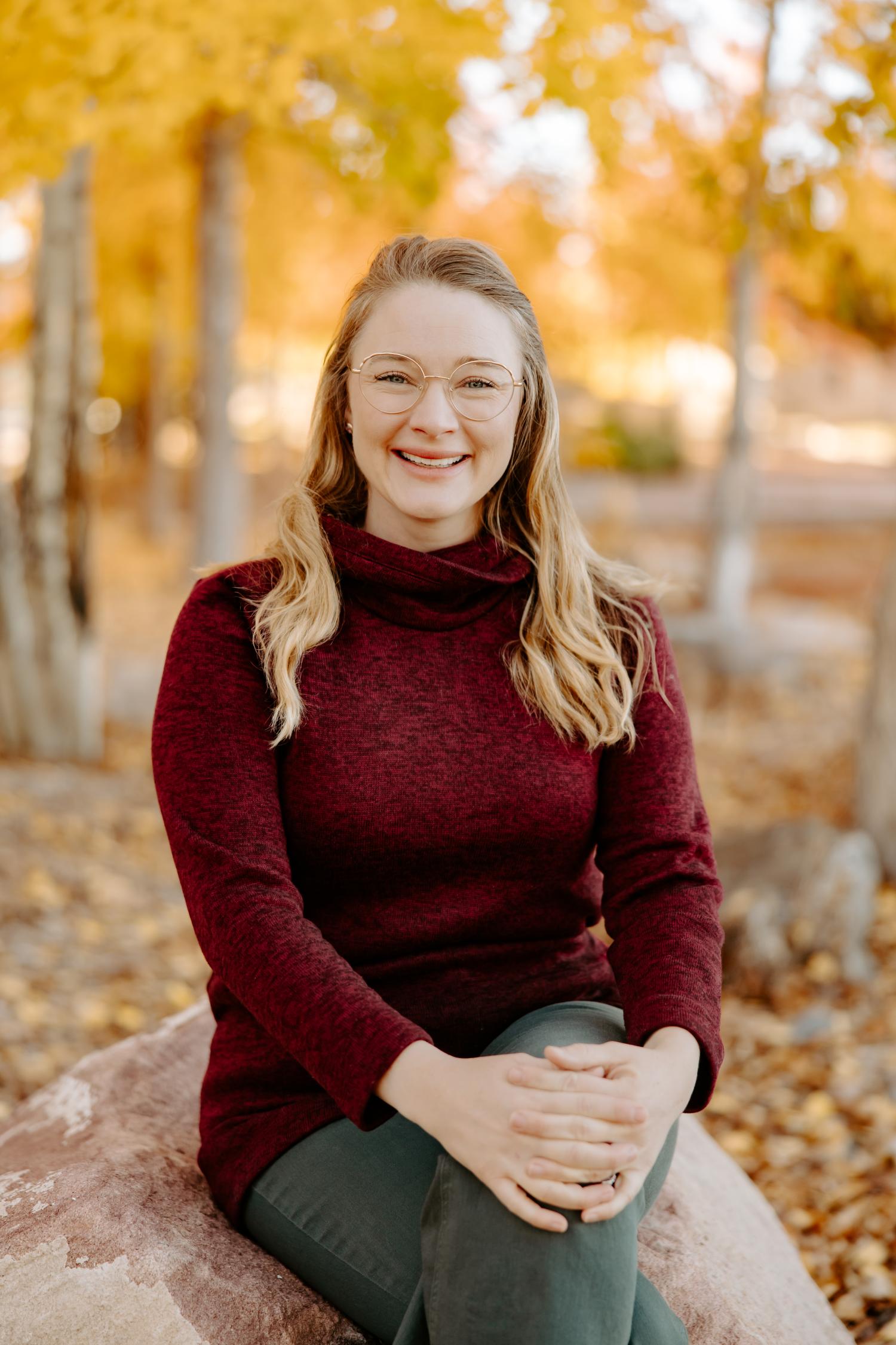 Kelly headshot fall scenery