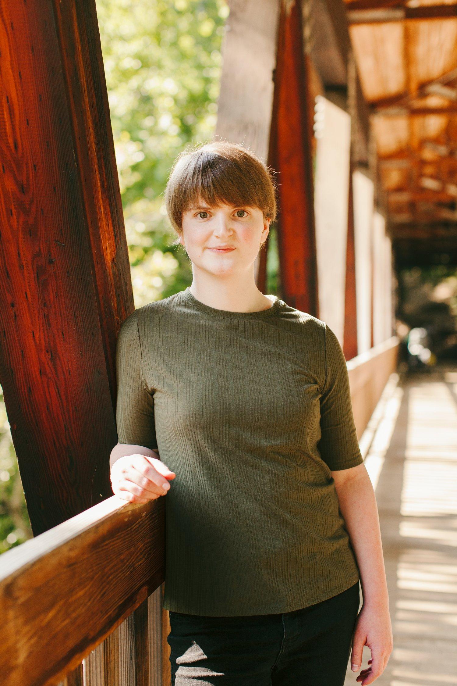 Skye standing on a bridge