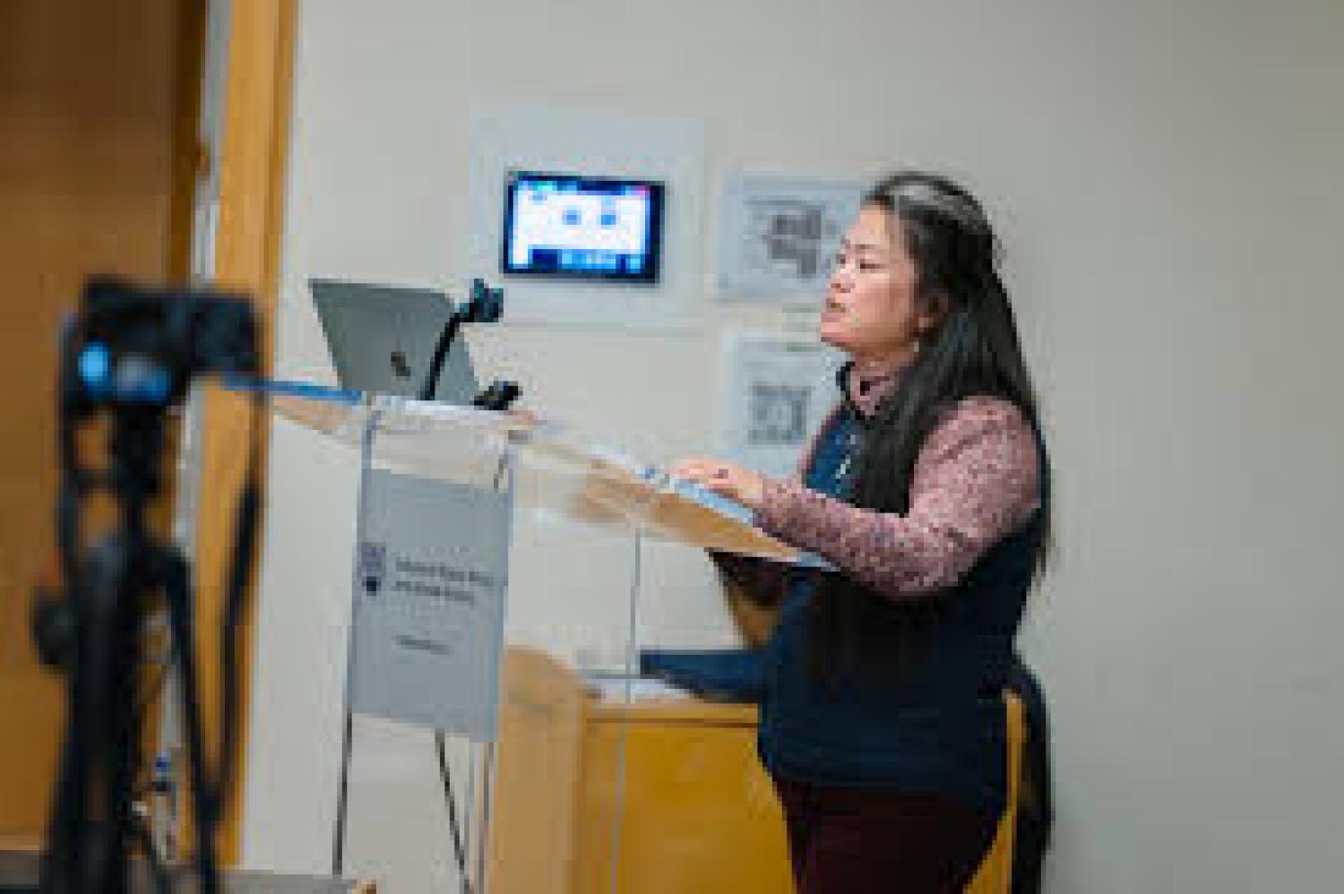 Dawa at a podium