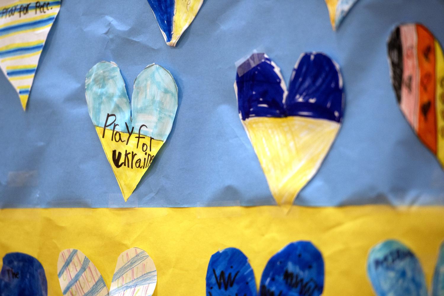 Student-made artwork hangs on the walls of the school Thursday, Feb. 22, 2024, at St. Nicholas Cathedral School in Chicago, Ill.