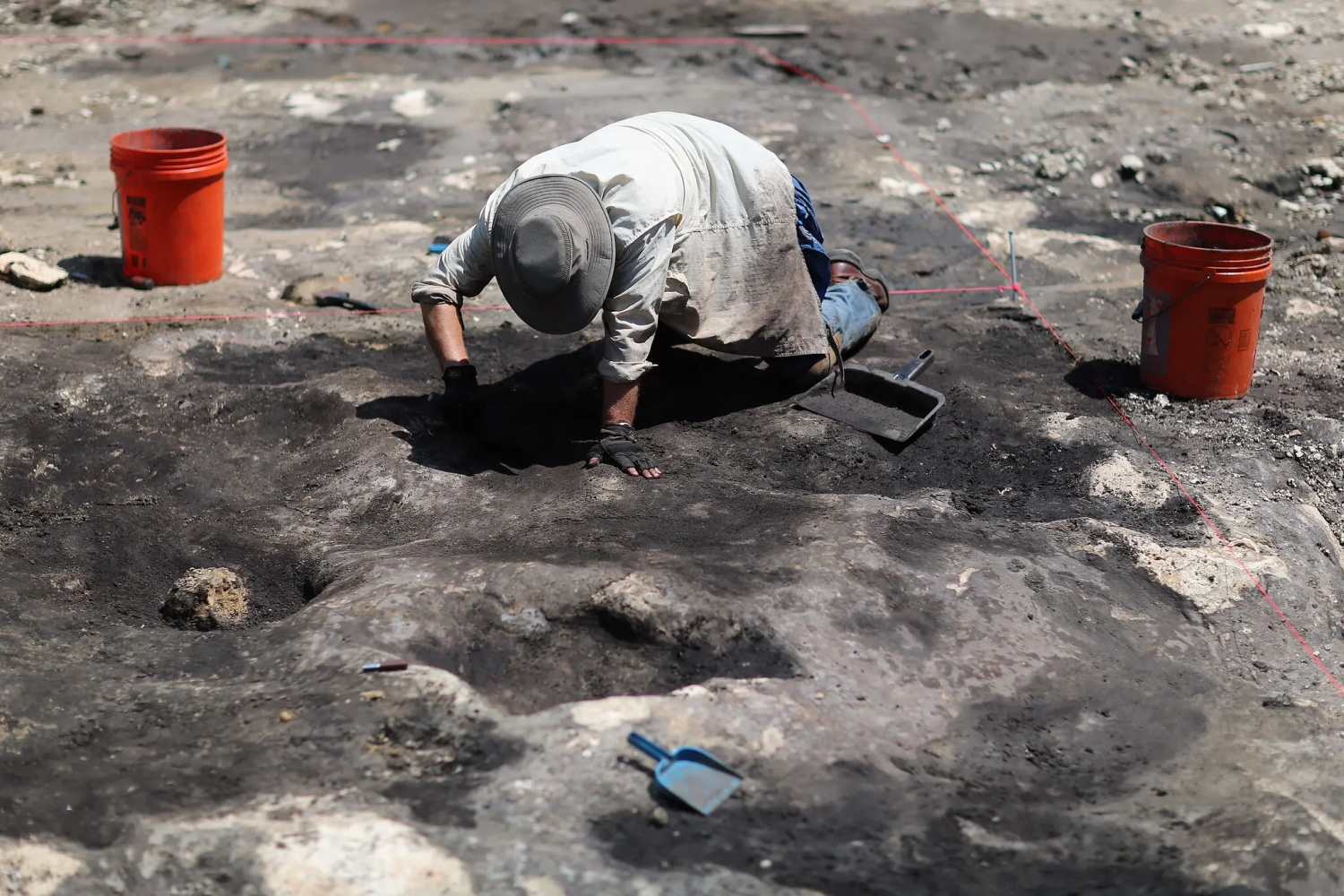 An archaeologist at the site of a 1,000-year-old Tequesta village in Miami in 2013