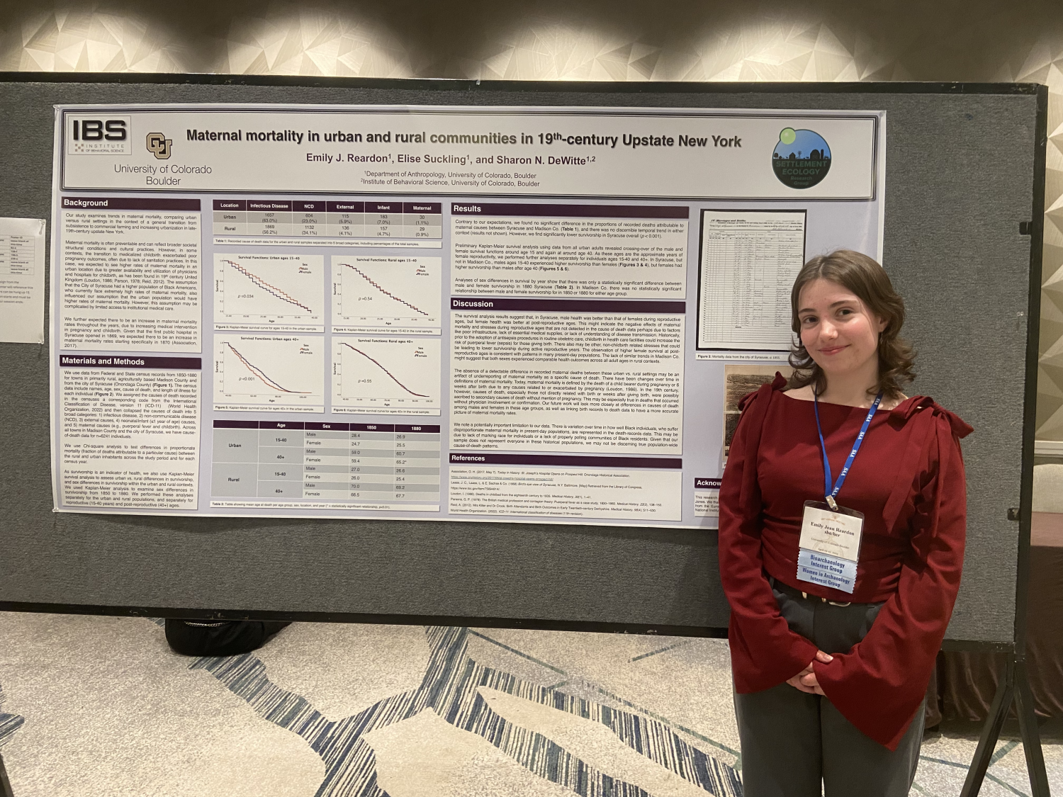 Emily Reardon in front of poster