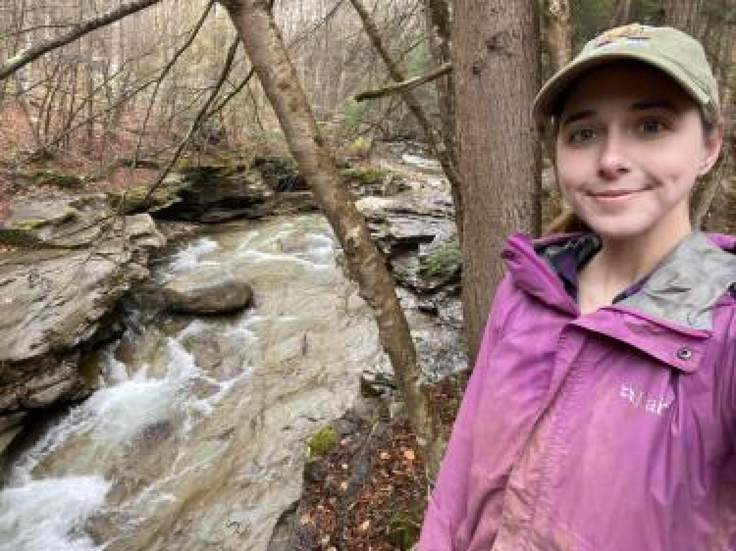 Gabrielle Perry next to a river