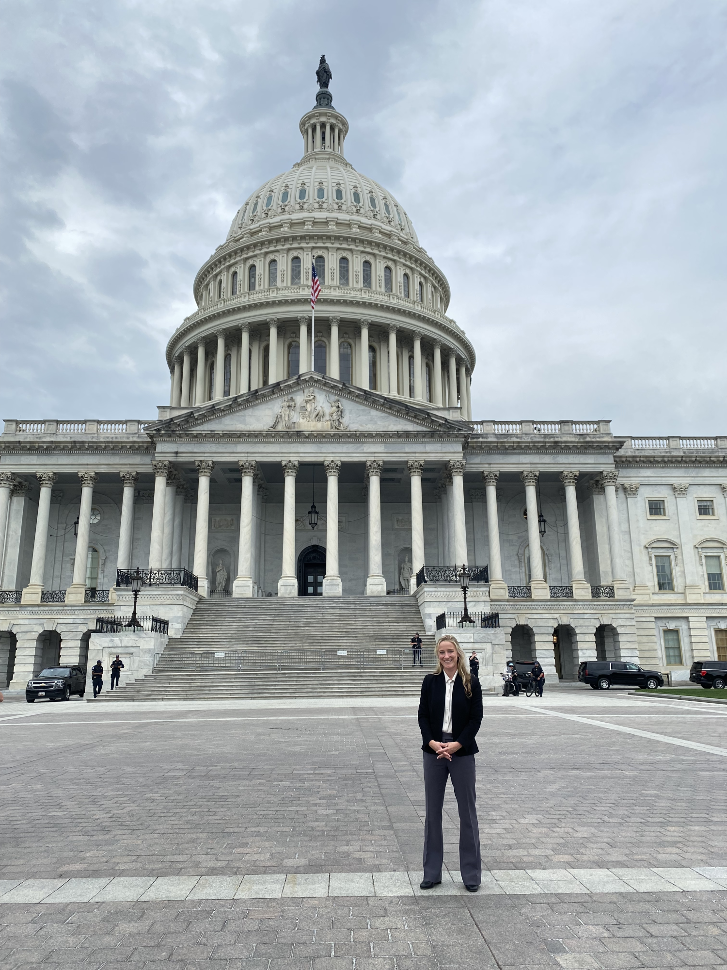 Georgia in front of a government building