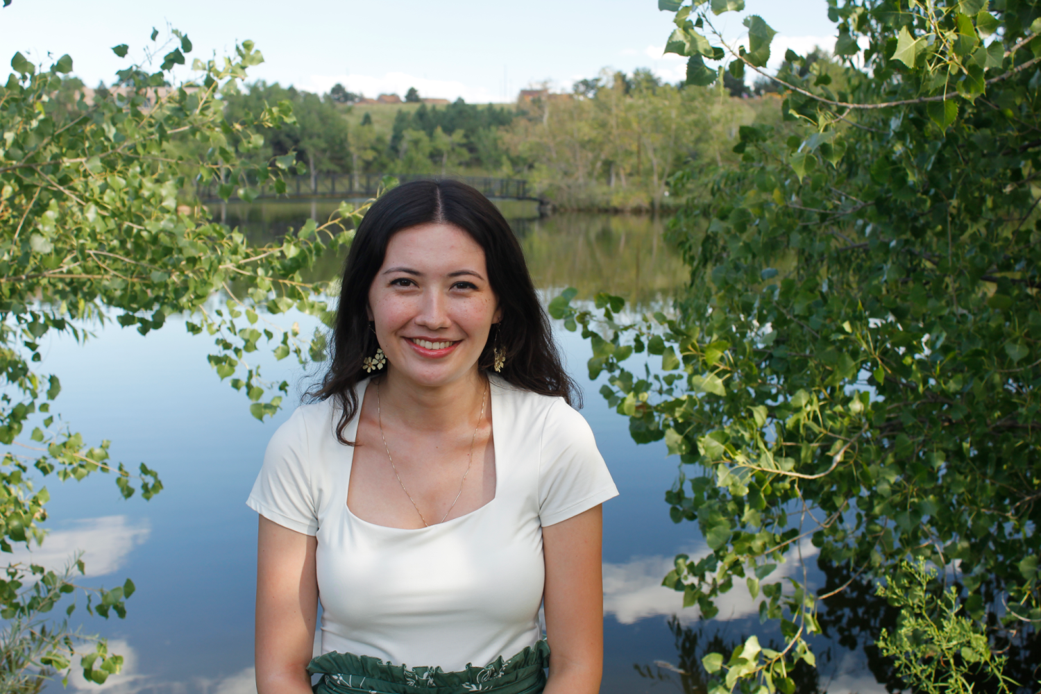 Jessica in front of a pond