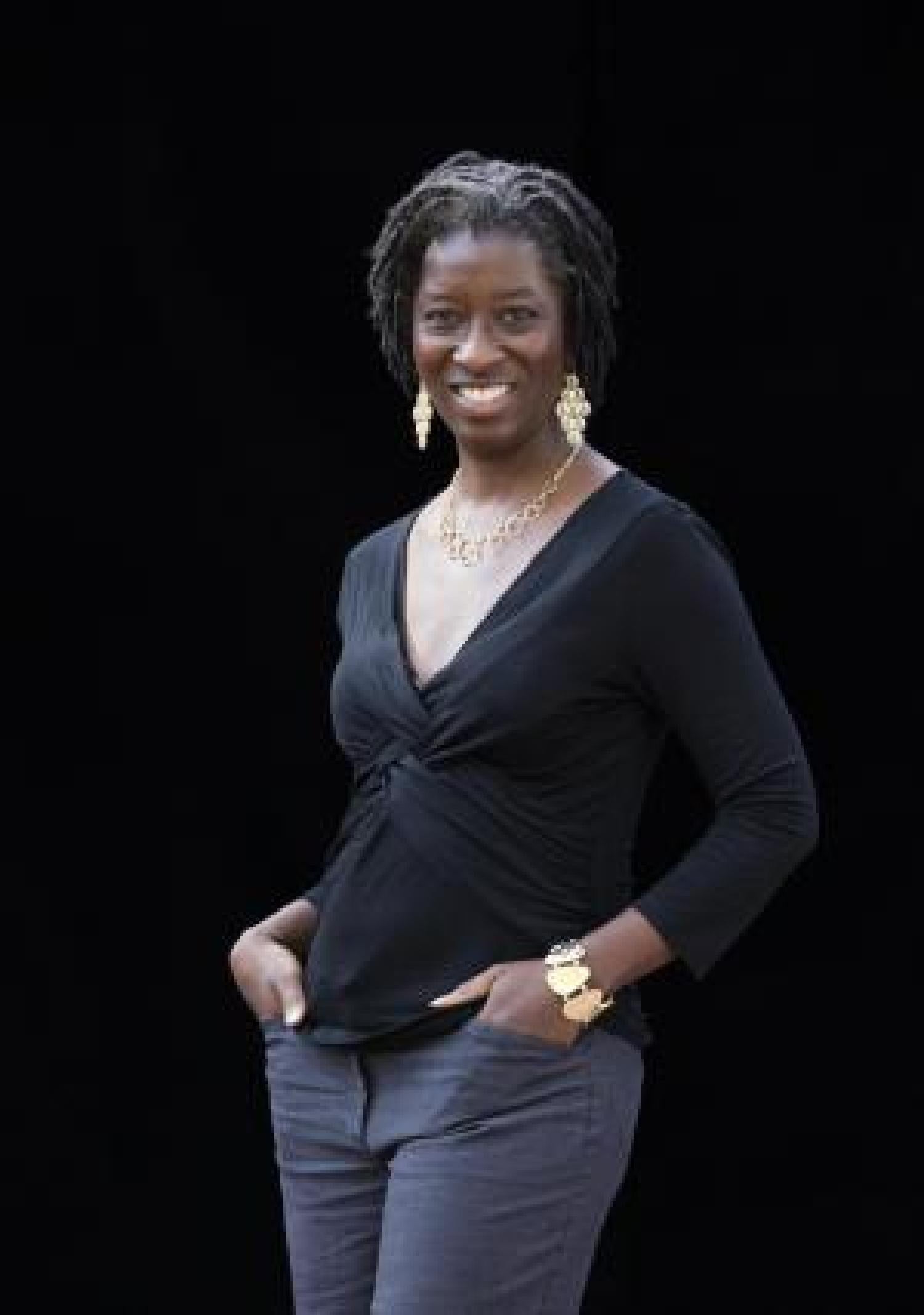 Kaifa Roland standing with black background
