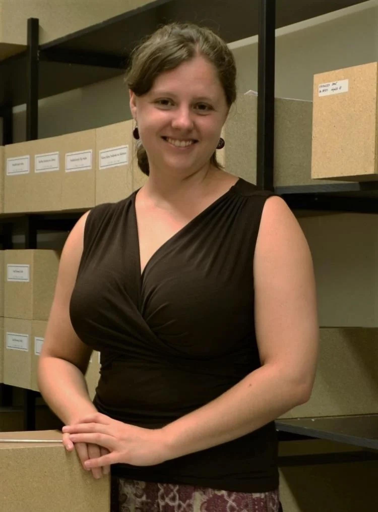 Lauren Hosek standing in her lab
