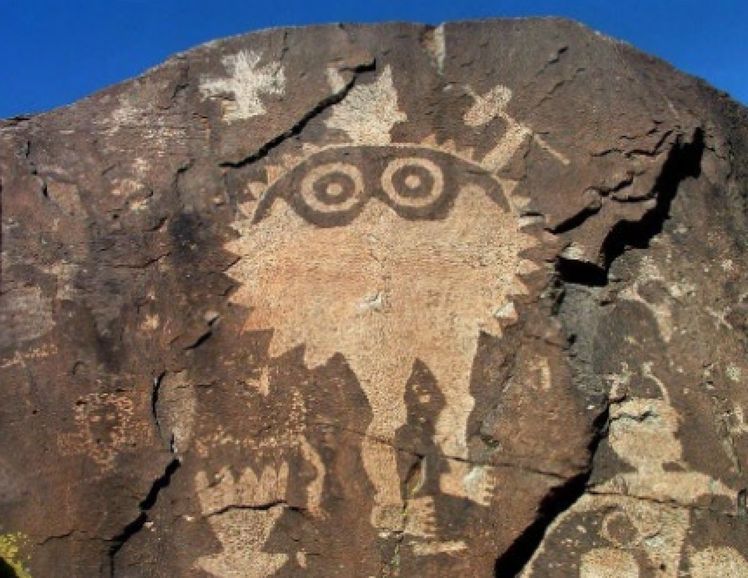 Rock carving depicting violence