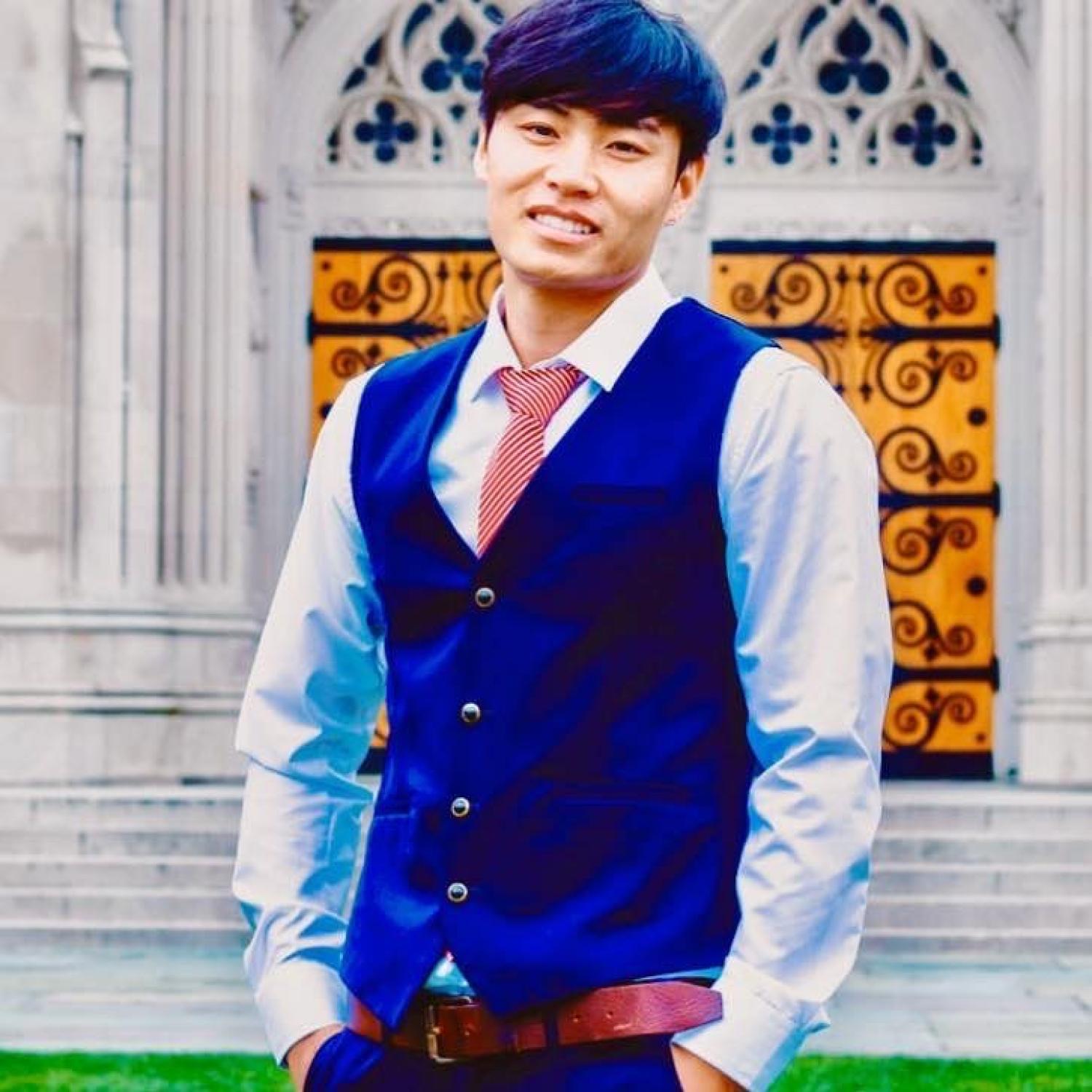 sangjie_zhaxi_in_front_of_building.jpeg