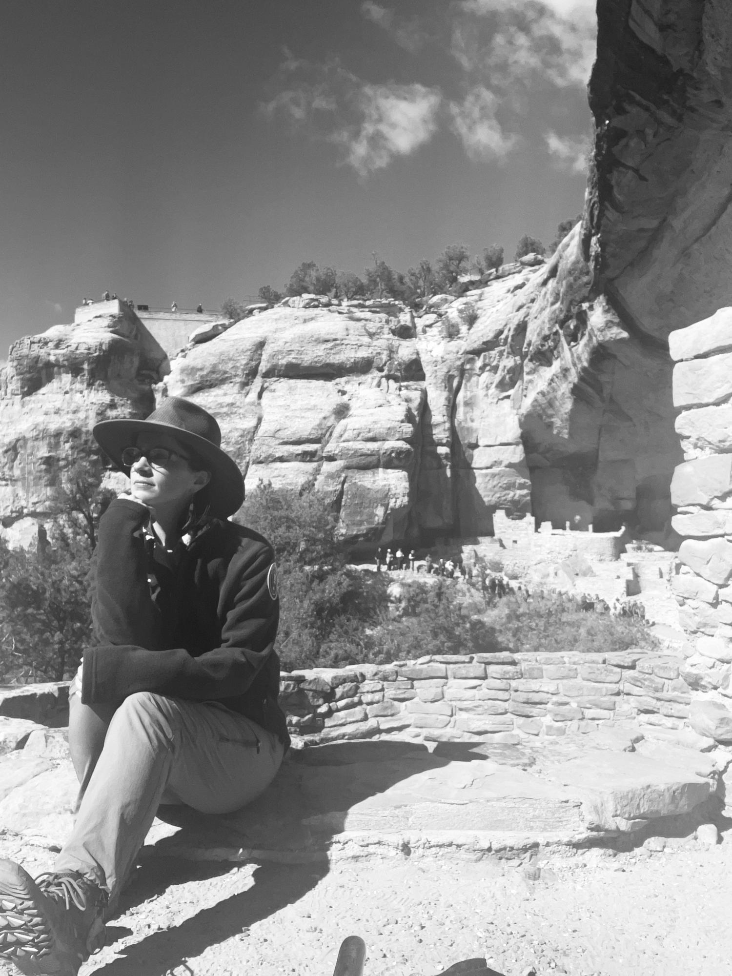 Black and white photo of Scarlett on the rocks