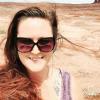 Alison Formanack wearing sunglasses in the desert