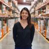 Cydney Justman standing in a warehouse