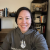 Emily Hite wearing a St. Louis University Sweatshirt