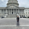 Georgia in front of a government building