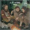 life in ruins podcast picture with men around a campfire
