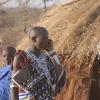 Maasai herder using a cell phone