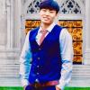 sangjie_zhaxi_in_front_of_building.jpeg