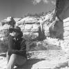 Black and white photo of Scarlett on the rocks