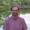 Scott Ortman in front of a pond