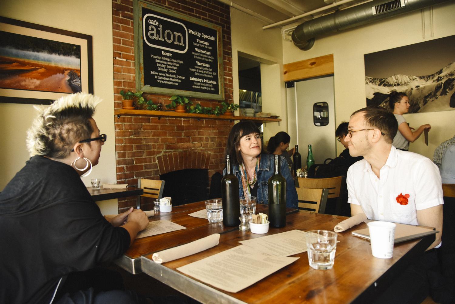 Phoebe Young, Jeremiah Lockwood, and Jewlia Eisenberg at work