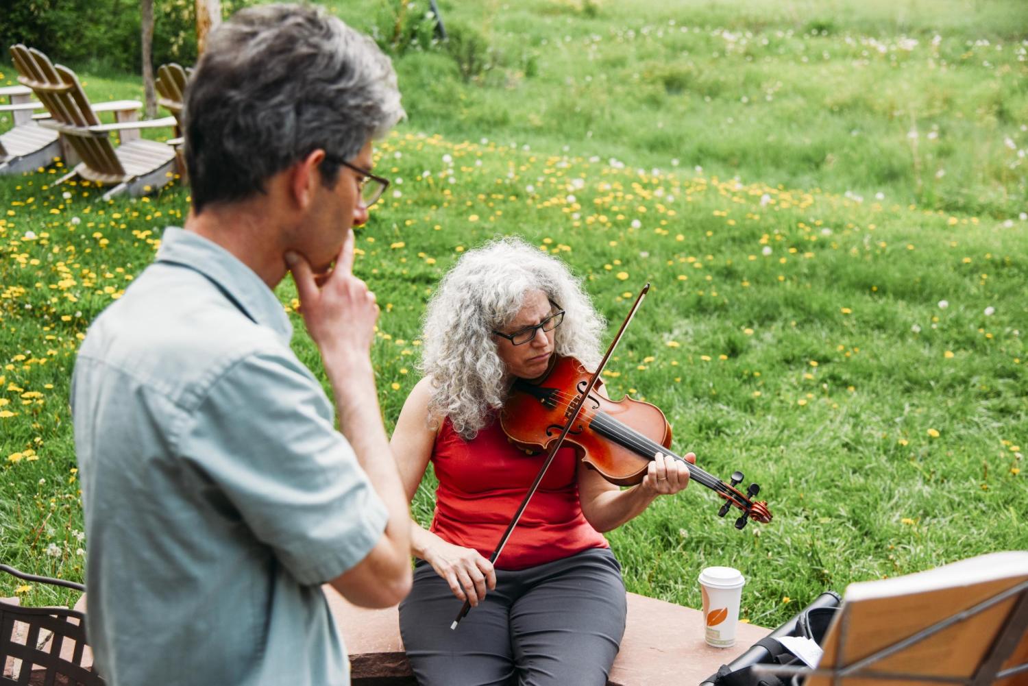 Alicia Svigals and Yonatan Malin rehearsing