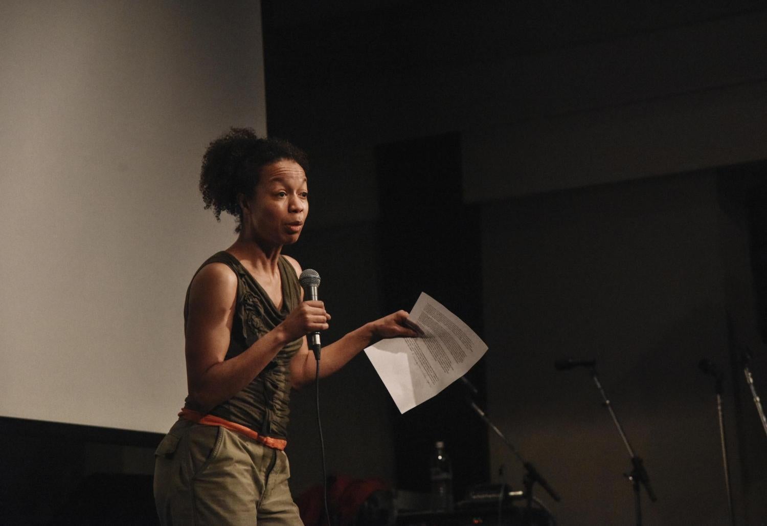 Gesel Mason on the stage delivering a talk
