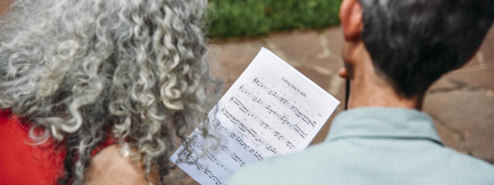 Alicia Svigals and Yonatan Malin reading music