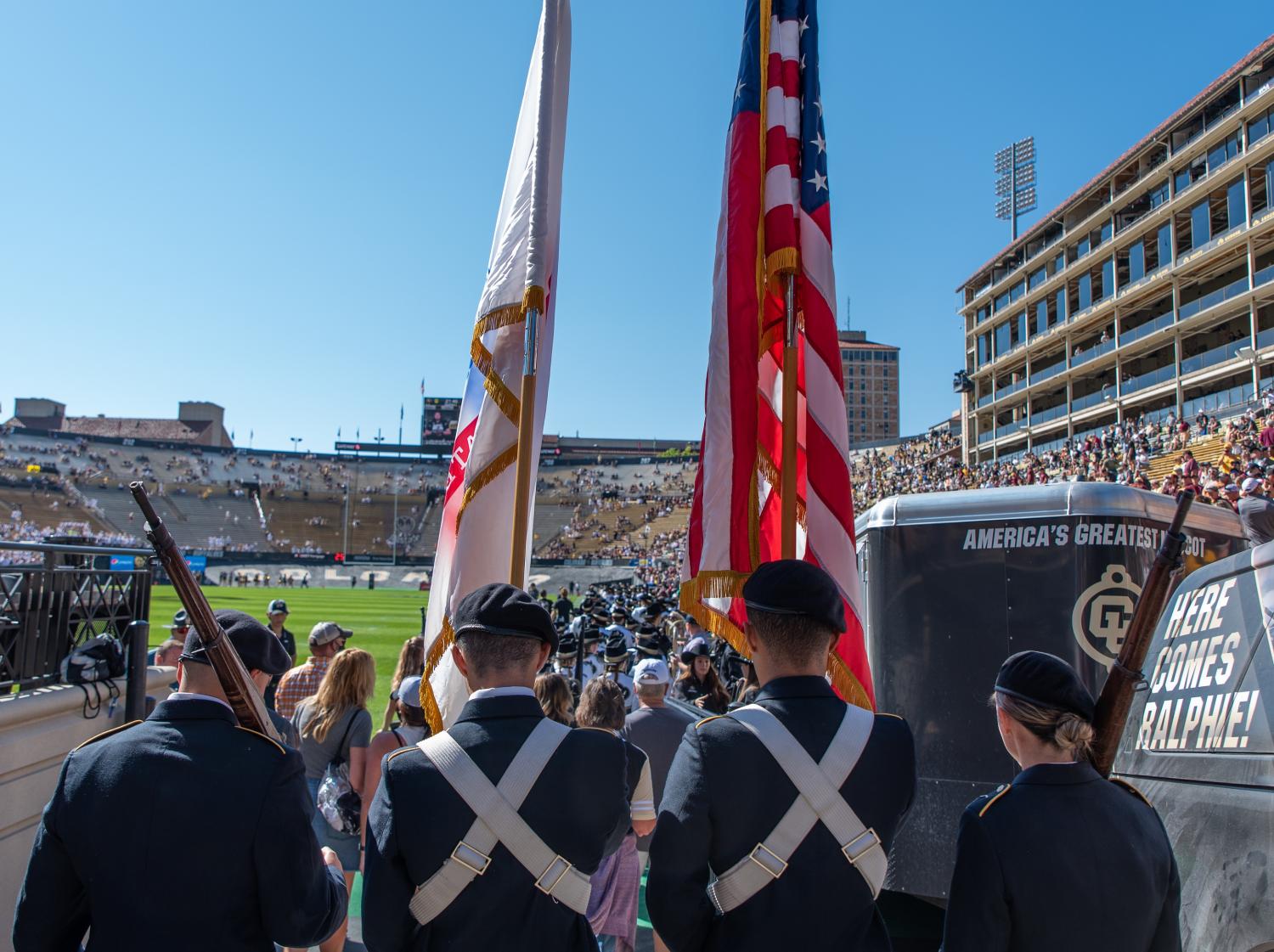 Army ROTC Color Guard Cadets march into Folsom Stadium to display the colors at the September 18th CU football game against Minnesota. Photo courtesy of Cadet Arianna Decker.