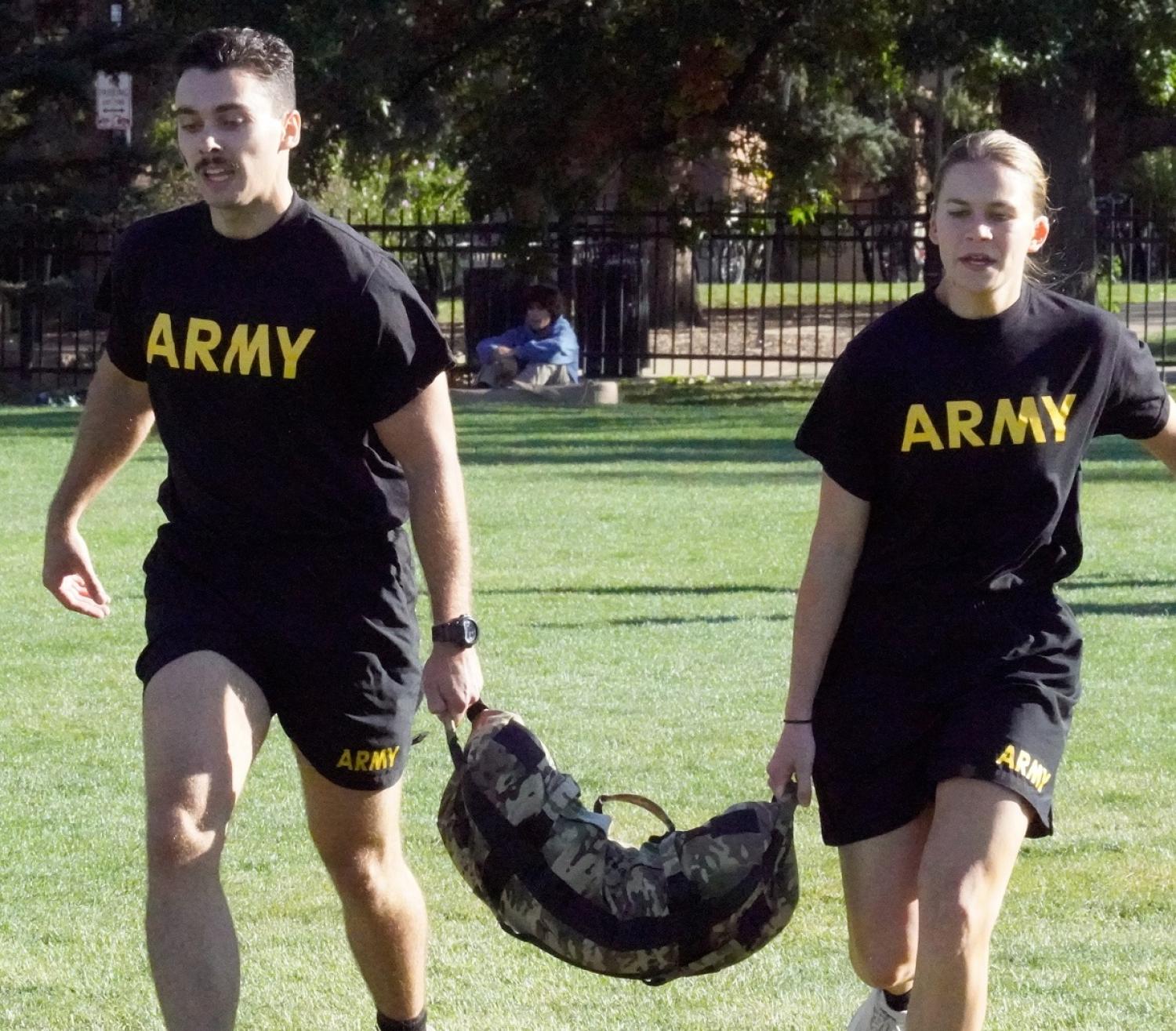 Army Cadets work together to run the sandbag carry around the field. Photo courtesy of AROTC CDT William Vlad.