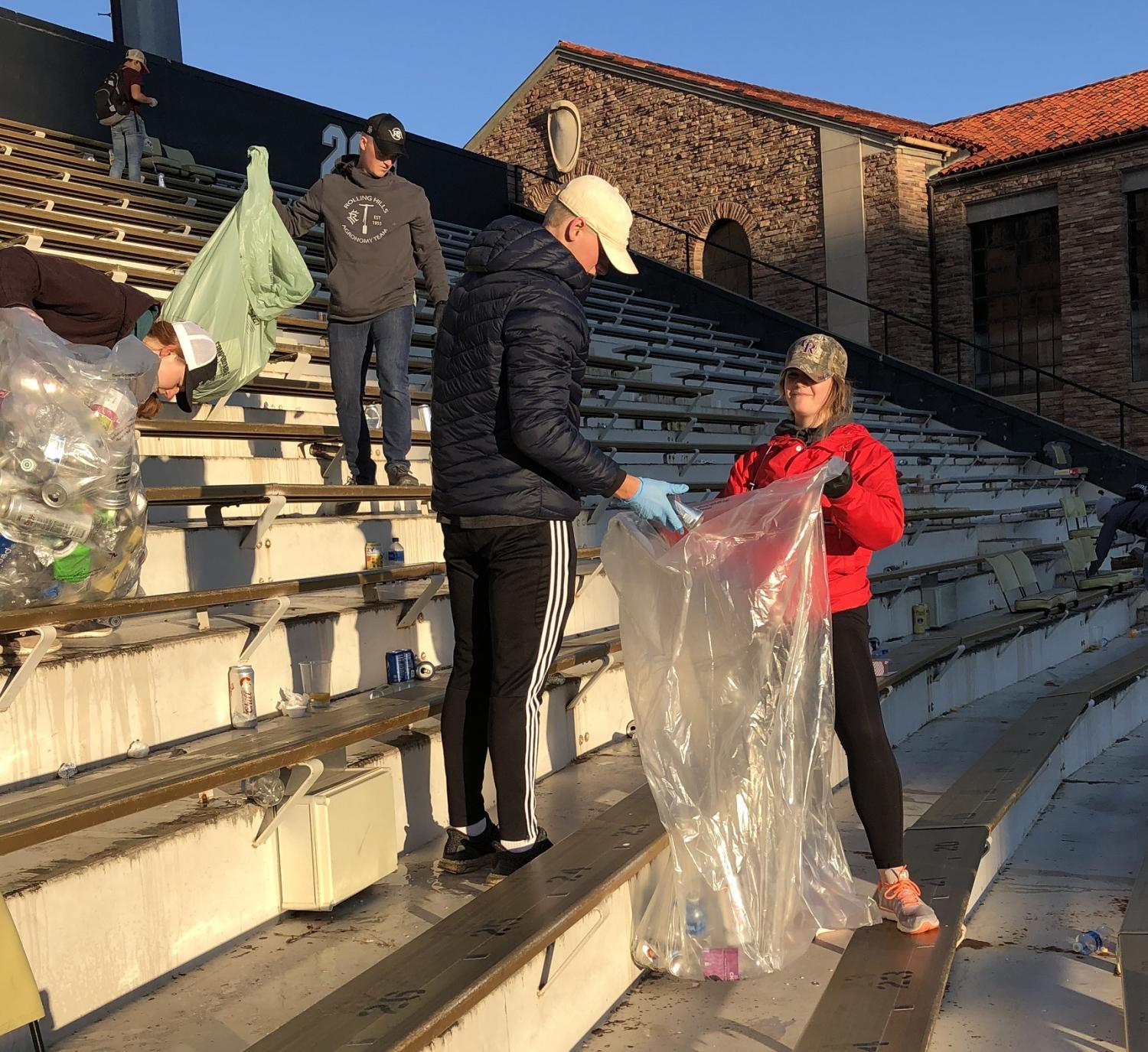 Army ROTC Cadets picking up the recycling, compost and waste left in the stands after their second home football game clean-up of the 2021 season.