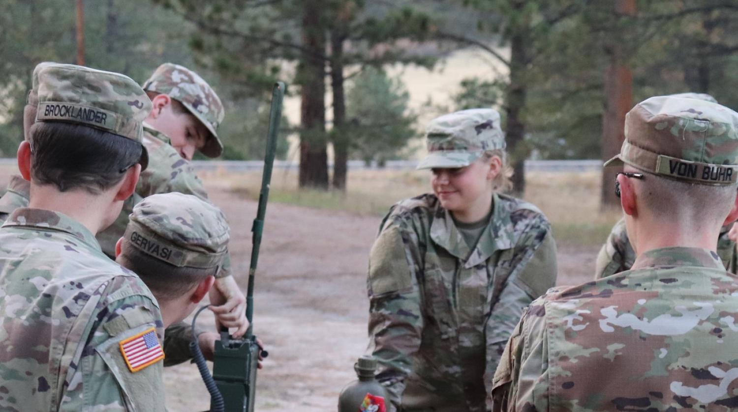 Cadets are shown how to put a field radio together. Photo courtesy of AROTC Cadet Preston Miglaw.
