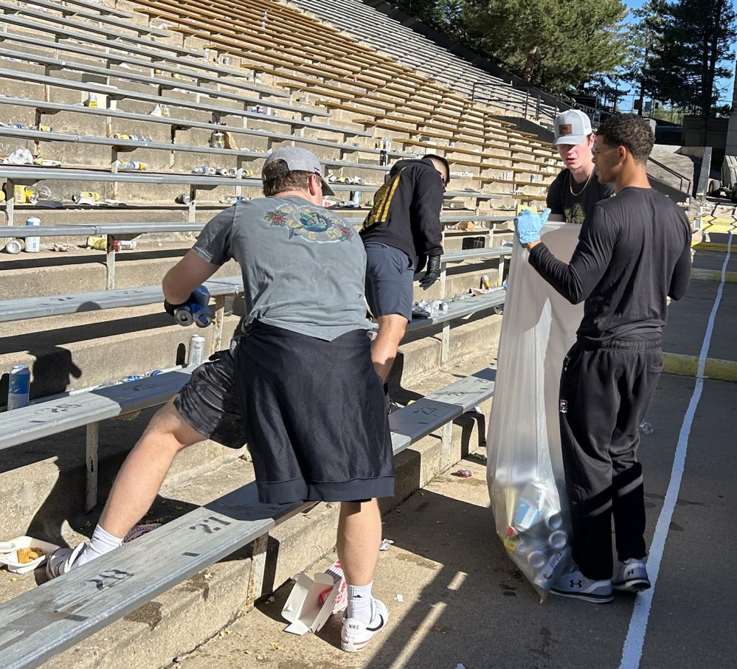 Army ROTC Cadets working diligently at the Stadium Clean-up after the second home football game of the 2023 season. Photo courtesy of the Golden Buffalo Battalion.