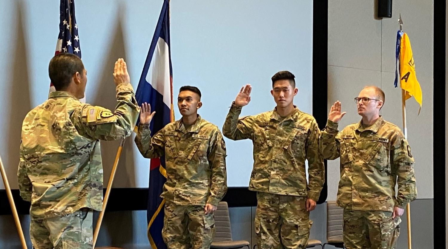 LTC Bryce Kawaguchi [left] is preparing to swear the three commissioning Cadets into the U.S. Army – [Cadets from left to right] CDT Danny Borja, CDT Austin Cha and CDT Harrison Harm. Photo courtesy of CPT Chris Head.