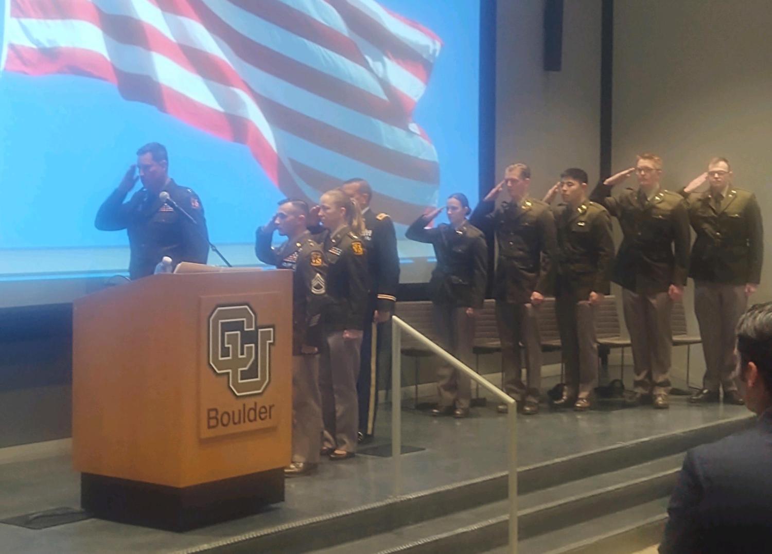 Army ROTC Fall 2023 Commissionees [from left to right]: CPT Chris Head, SFC Jacob Thompson, LTC Lynae Place, COL David Ray – commissionees 2LT Courtney Lucas, 2LT Ryan Kowalczyk, 2LT Isaac Mun, 2LT Evan Kistler, and 2LT Wyatt Bohren. Photo courtesy of the Golden Buffalo Battalion.