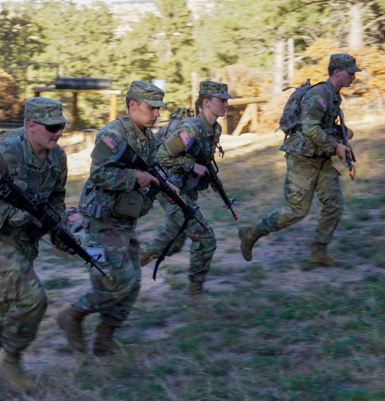 Army ROTC Leader Development Exercise (LDX) Fall 2023 – Cadets receive squad instructions for a quick move-out and reposition patrol base front line. Photo courtesy of Cadet William Vlad.