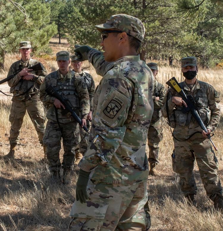 Cadets receive critical feedback from LTC Kawaguchi after they completed a maneuver. Photo courtesy of Cadet Arianna Decker.