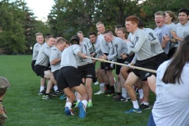 Army ROTC Cadets pulling rope during tug-of-war at Tri-Mil Competition.