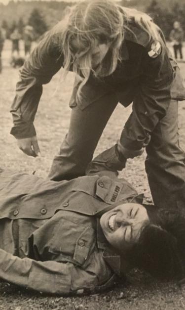 Cadet Rigby practicing the Art of Self-Defense with Cadet Vickie Nichols from U of A. Both cadets were assigned to Company “A” at the 1975 Fort Lewis ROTC Advanced Camp. Photo courtesy of PFC Annemarie Nicholson, 24 June 1975, 9th Division, Fort Lewis, WA.